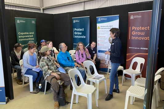 People sitting listening to a speaker at a planning session